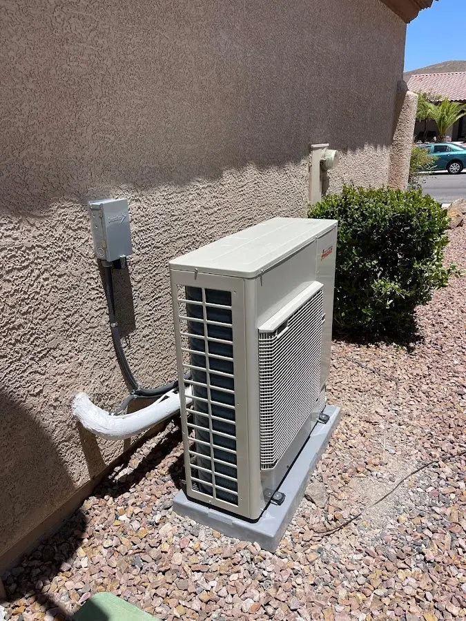 Residential air conditioning condenser unit in Grantsville